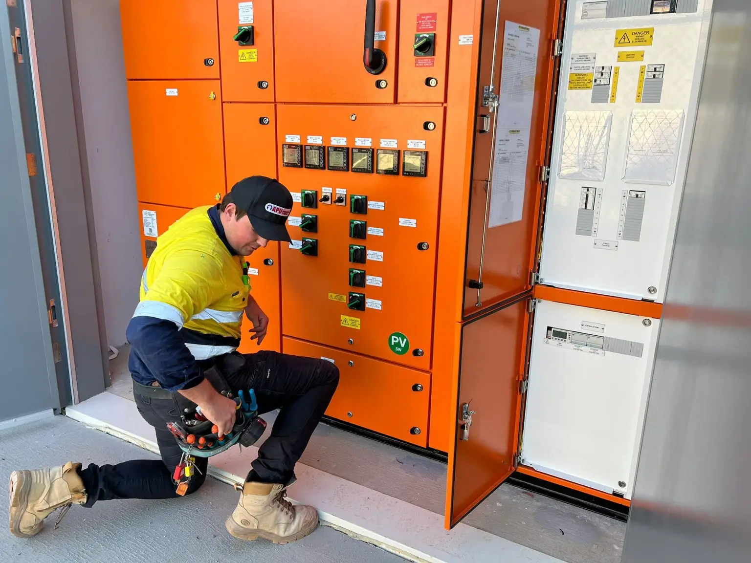 GAP Industries male technician installing a switchboard in Gold Coast