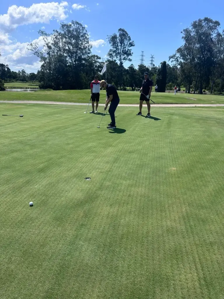 GAP Industries team enjoying a sunny day at the Brisbane Golf Club, participating in a charity event to raise funds for veterans and their families.